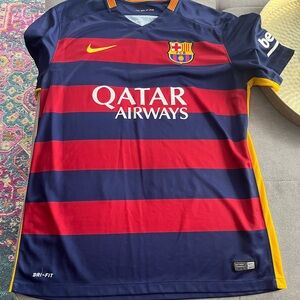 Nike men’s size large FC Barcelona jersey.